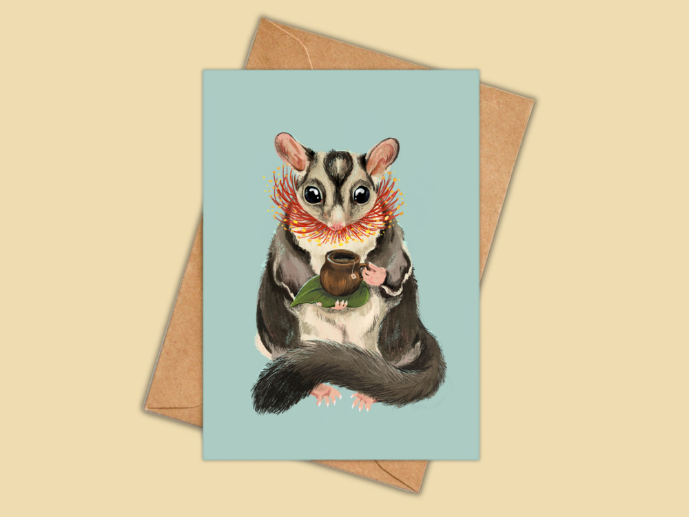 Card with a sugar glider illustration holding a cup on a beige background
