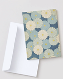 Floral patterned card with a matching envelope on a white background