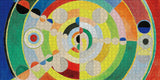 Colorful abstract design with concentric circles and geometric shapes on a red background