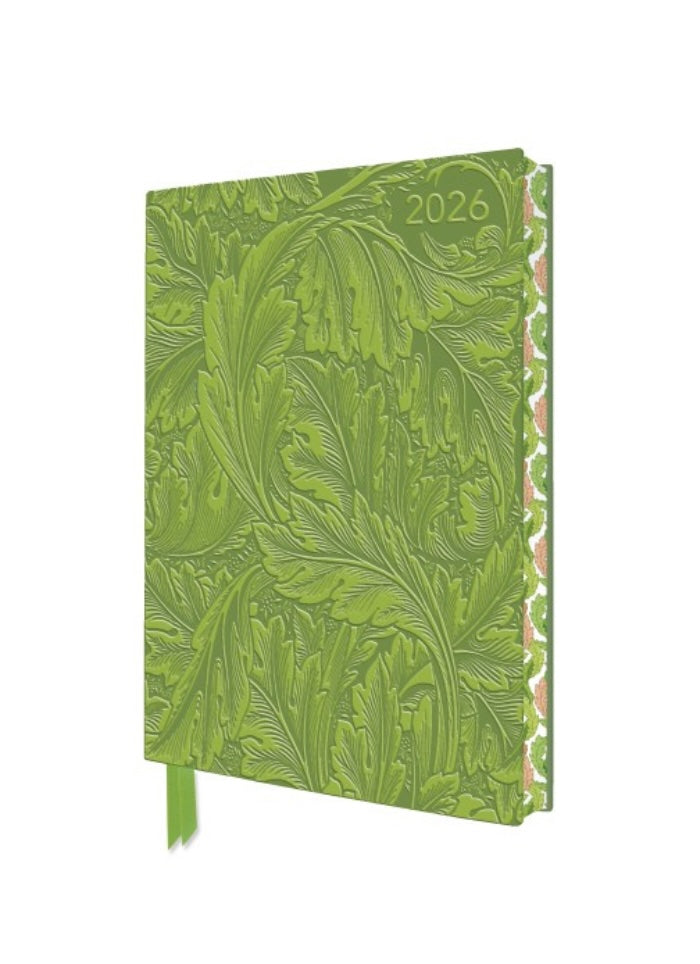 Green embossed notebook with floral design and '2026' on a white background