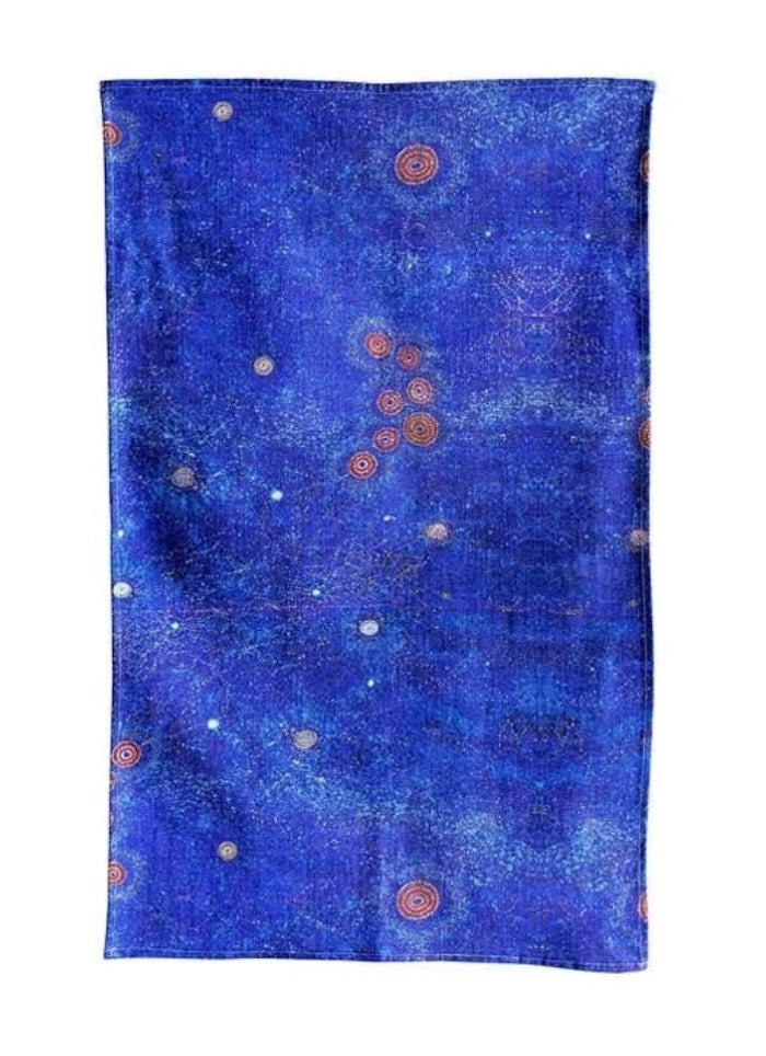 Blue fabric with circular patterns on a white background