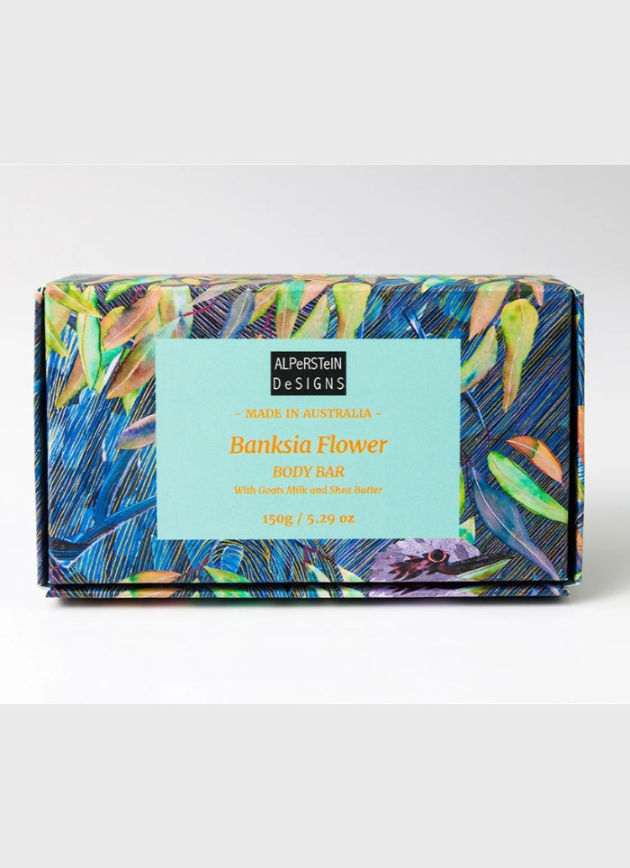 Soap bar with colorful packaging and a visible label on a white background