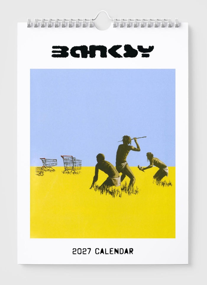 2027 calendar with artwork by Banksy featuring three figures and shopping carts on a blue and yellow background.