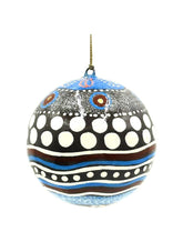 Decorative ornament with polka dot and striped pattern on a white background