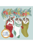 A Christmas-themed illustrated card featuring three dogs peeking out of knitted Christmas stockings under a garland banner. The left stocking is red, the center is white with green stripes, and the right is olive green.
