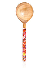 Wooden spoon with a colorful handle on a white background