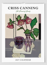Front cover of Criss Canning calendar with a still life in purples of helebores in a glass vase next to another vase.