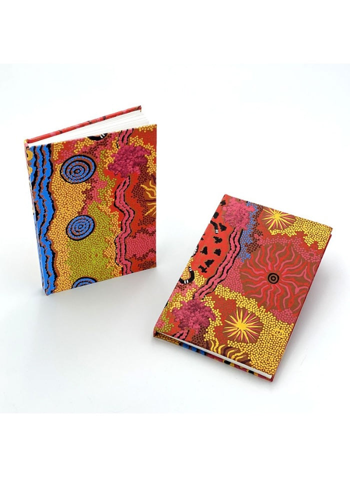 A handmade notebook from Better World Arts with art by Damien Marks.