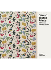 Book cover with Danish textile print design and text about 100 years of craft and design.