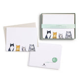 Set of cat-themed notecards with envelopes and a box packaging on a white background