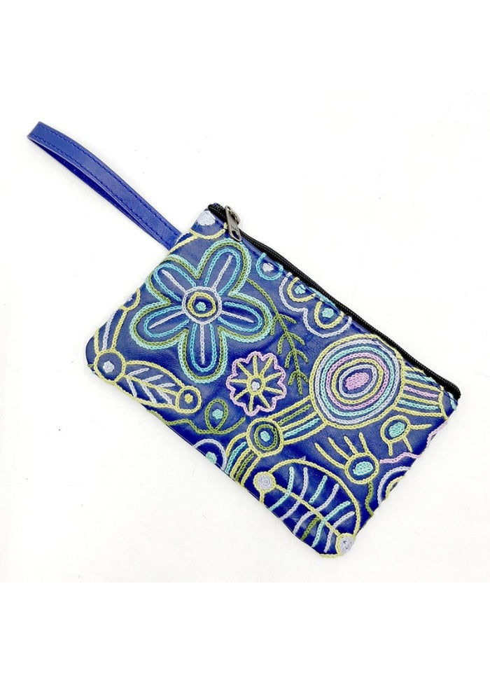 Blue pouch with floral patterns on a white background