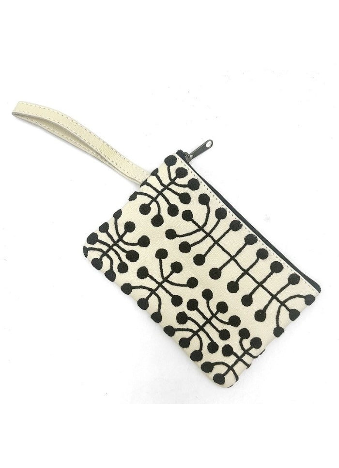 Small pouch with black geometric pattern on a white background