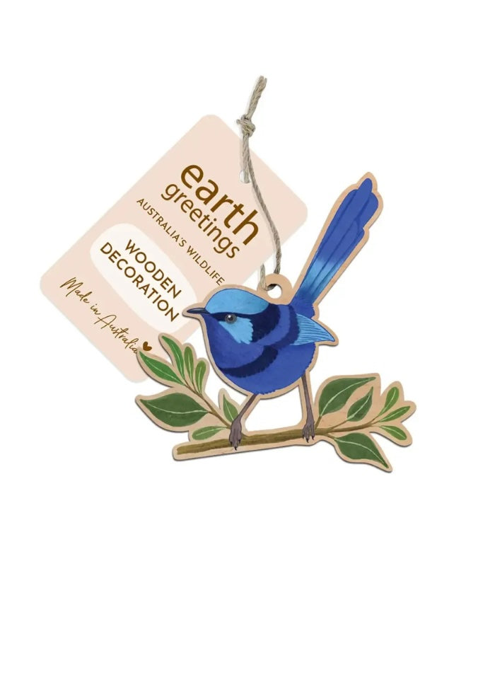 Blue bird decoration on a branch with 'earth greetings' tag on a white background