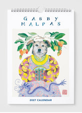Front cover of Gabby malpas calendar with a painting of a dog in clothin with a dragon and tree.