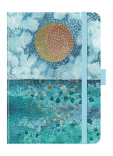 Notebook with a colorful design featuring a sun and abstract patterns on a blue background.