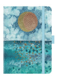 Notebook with a colorful design featuring a sun and abstract patterns on a blue background.