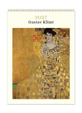 Gustav Klimt 2027 calendar with a gold-leafed portrait of a woman on a white background