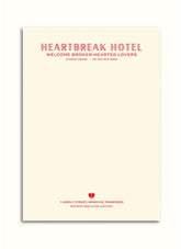 Invitation card for 'Heartbreak Hotel' with text and a heart symbol on a white background
