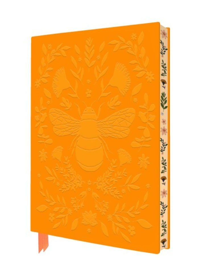 Orange notebook with bee and floral design on a white background