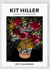 Front cover of large Kit Hiller calendar with a vase of warratahs and other native flowers.