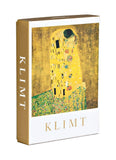 Book or box with 'Klimt' branding and a depiction of 'The Kiss' on a yellow background.