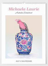 Calendar cover with a pink cockatoo on a floral vase, featuring the brand 'Michaela Laurie'.