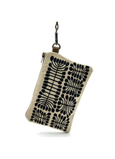 A small purse produced by Better World Arts and based on artwork by Mitjili Napurrula.