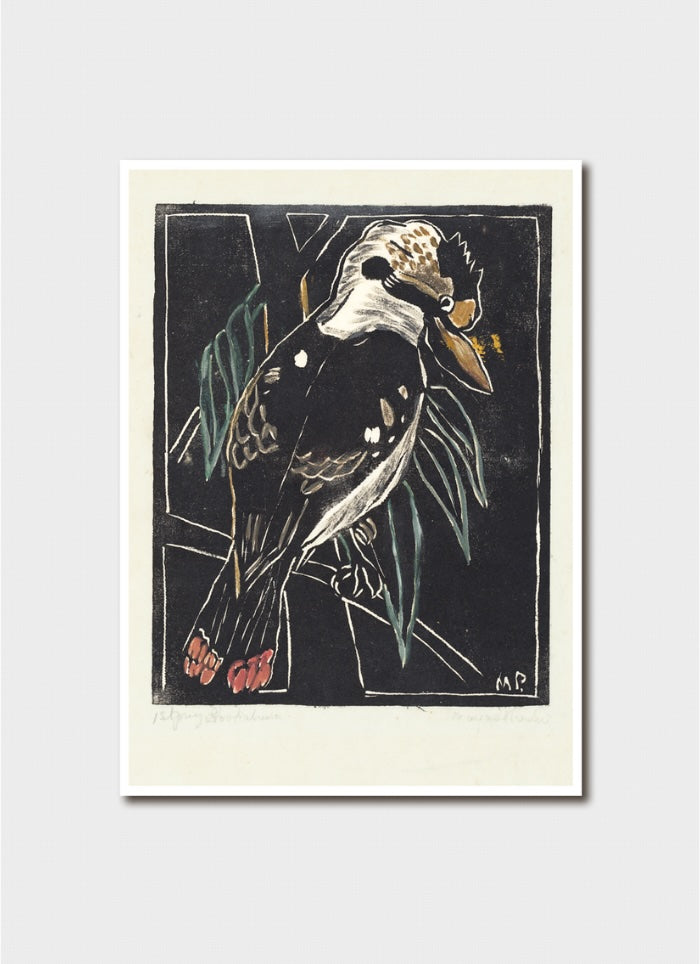 A card featuring a stylized bird illustration on a dark background, shown against a light gray wall. The print has a cream border and the artwork uses black, white, gray, green, orange, and red tones.