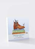 Christmas card pack with boots and books illustration on a light blue background