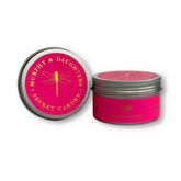 Two round metal tins for candles on a white background. One tin is open, showing a bright pink lid with gold lettering that reads 'MURPHY & DAUGHTERS SECRET GARDEN' and a gold dragonfly. Murphy & Daughters Travel Candle - Wild Things