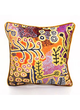 Decorative pillow with colorful abstract pattern on a white background