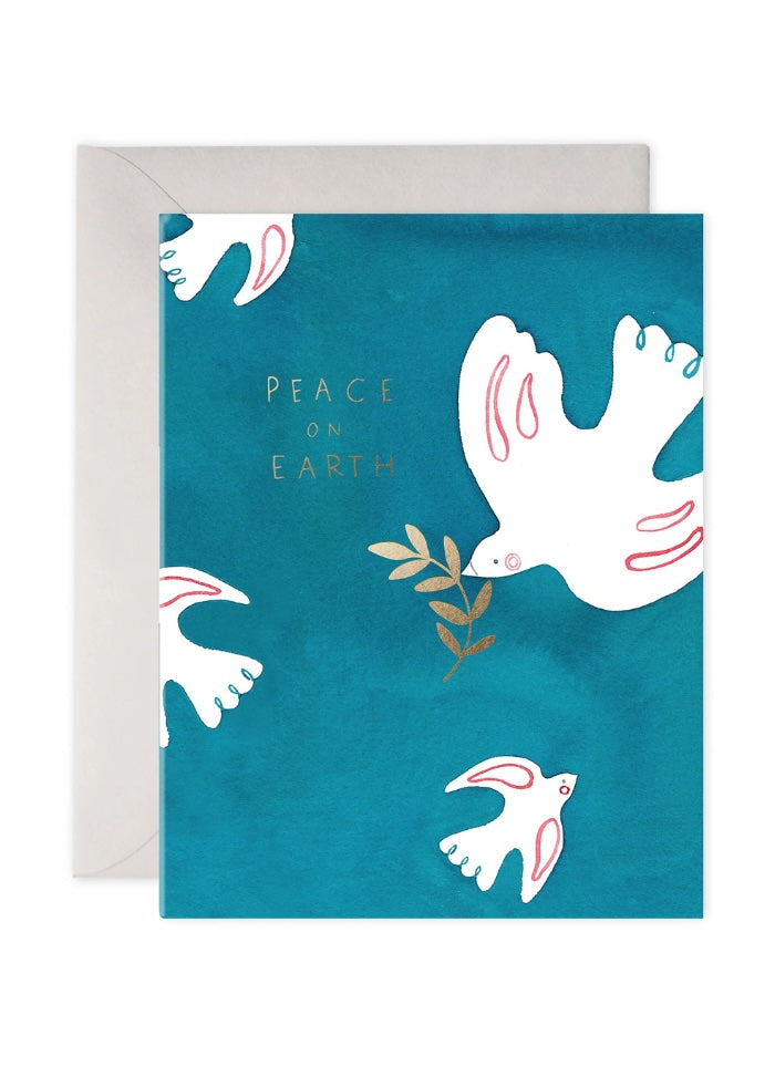 Greeting card with doves and 'Peace on Earth' text on a blue background
