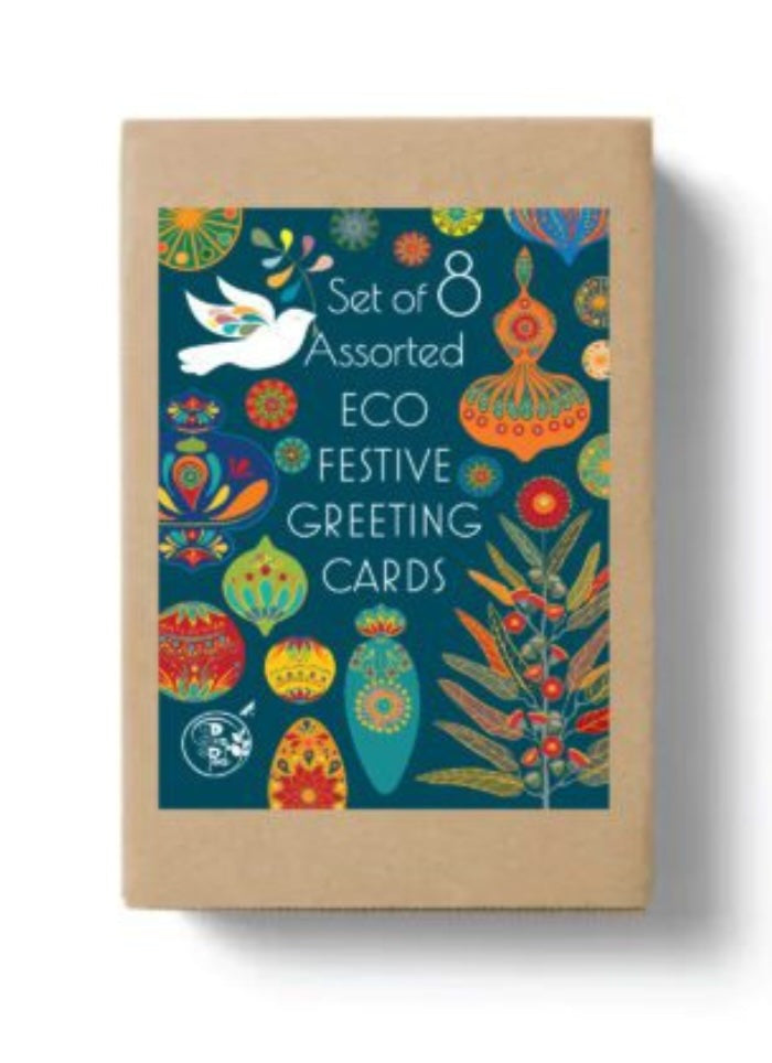 Box of assorted eco festive greeting cards with colorful designs on a white background