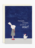 A dark blue card with a white bunny and chicken on the front and the words Twinkle, twinkle, you're a star!