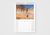 Calendar with a painting of a landscape on the cover