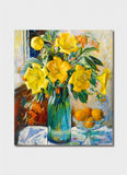Painting of yellow flowers in a vase with oranges on a table
