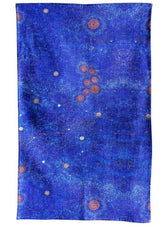 Blue patterned fabric with circular designs on a white background