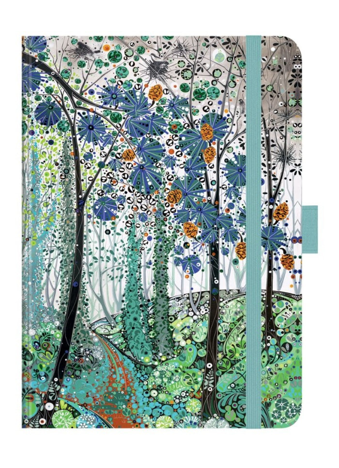 Notebook with a colorful forest design on the cover