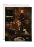 A dark room with a man in a eed suit and a dog below a treee covered in lights.