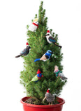 felted bird decorations displayed on a Xmas tree