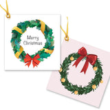 2 gift tags with a green wreath with red and gold ribbon and the words merry Christmas.