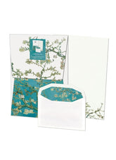 Set of stationery items with floral design on a white background