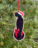 Red-tailed Black Cockatoo wooden Christmas decoration by Earth Greetings in a tree.