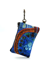 A small purse produced by Better World Arts and based on artwork by Julie Woods.