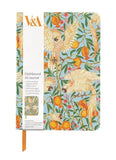 Notebook with parrot and floral design on a white background