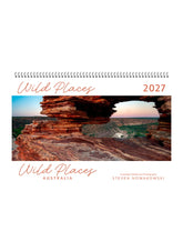 Calendar cover with a scenic view of a natural arch and the text 'Wild Places 2027 Wild Places Australia Steven Nowakowski'.