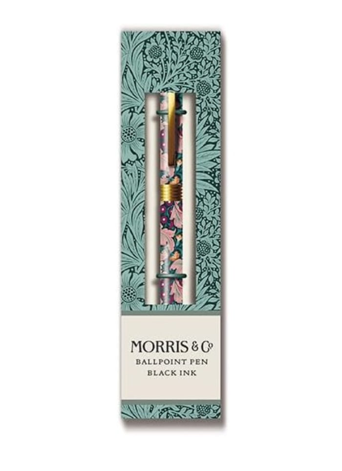 Ballpoint pen with floral design in packaging on a white background