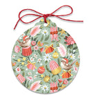 A round hanging ornament with a red string bow at the top, featuring a whimsical floral and bird pattern in pink, red, yellow, green, and white on a muted sage background.