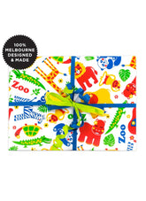 Gift box with colorful zoo-themed design on a white background