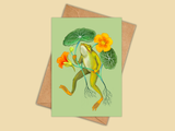 Greeting card with a frog and flowers design on a beige background